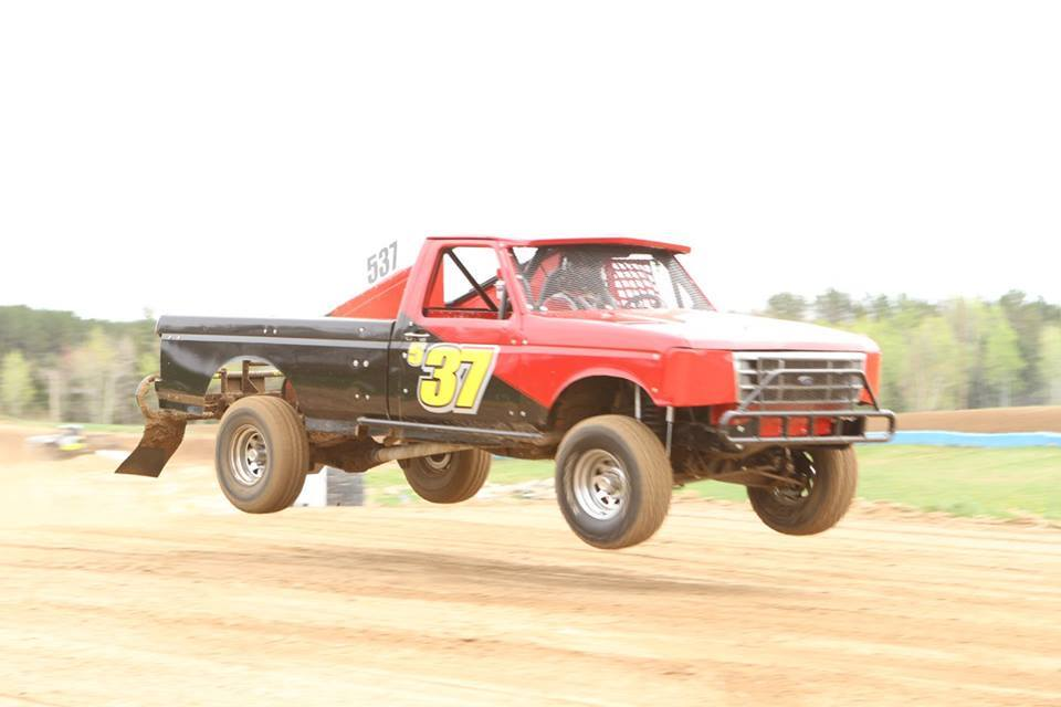 A classic Ford F-150 in the Stock Truck Series